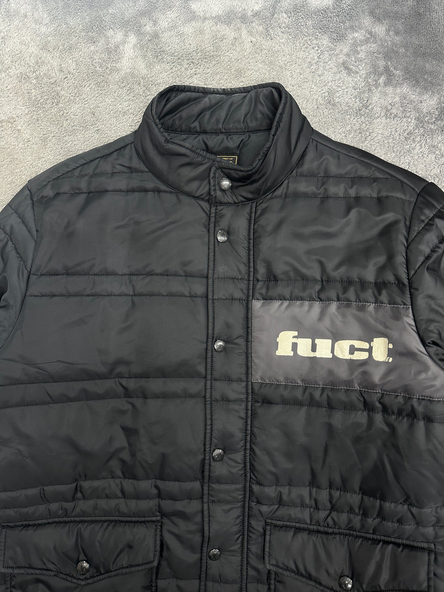 [L] FUCT SSDD Lightweight Puffer Jacket